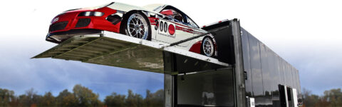 TRANSPORTATION OF CARS ON OPEN TRUCKS AND TRAILERS